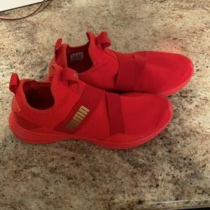 Red Puma sneakers